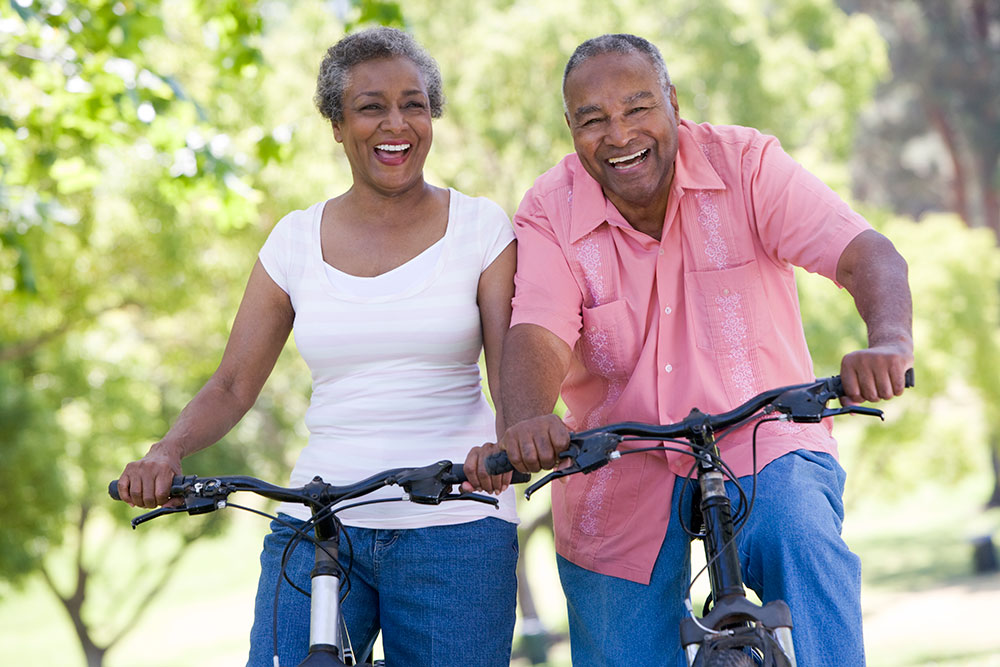 Elderly Couple Biking Together